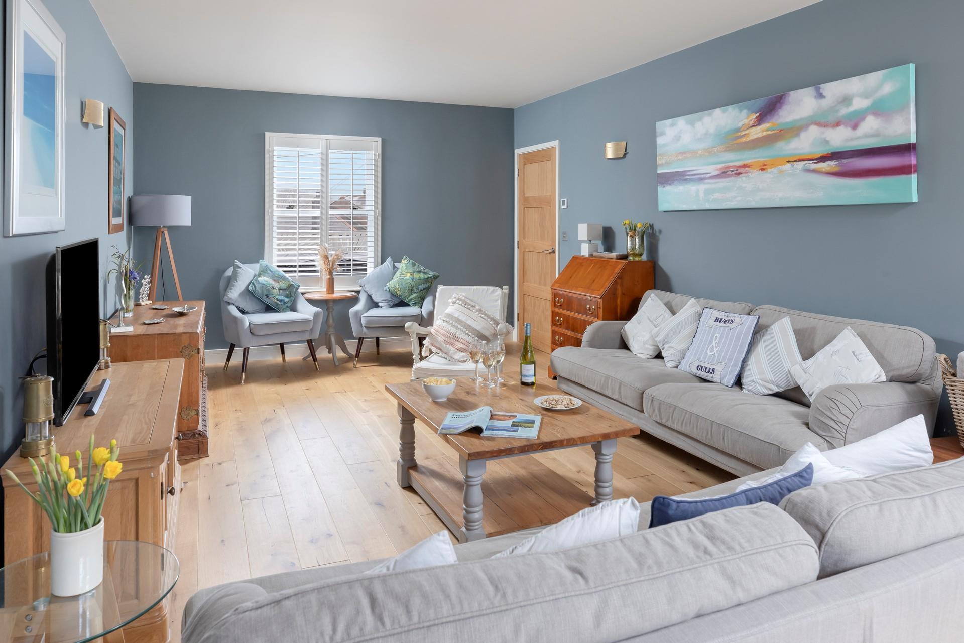 Pour yourself a drink and sink into the comfortable sofas.