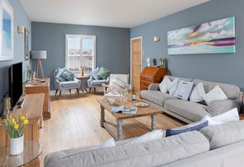 Pour yourself a drink and sink into the comfortable sofas.