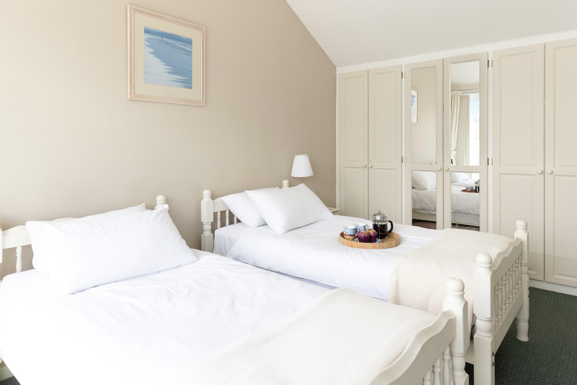 The spacious bedroom has plenty of storage space for your holiday wardrobe.