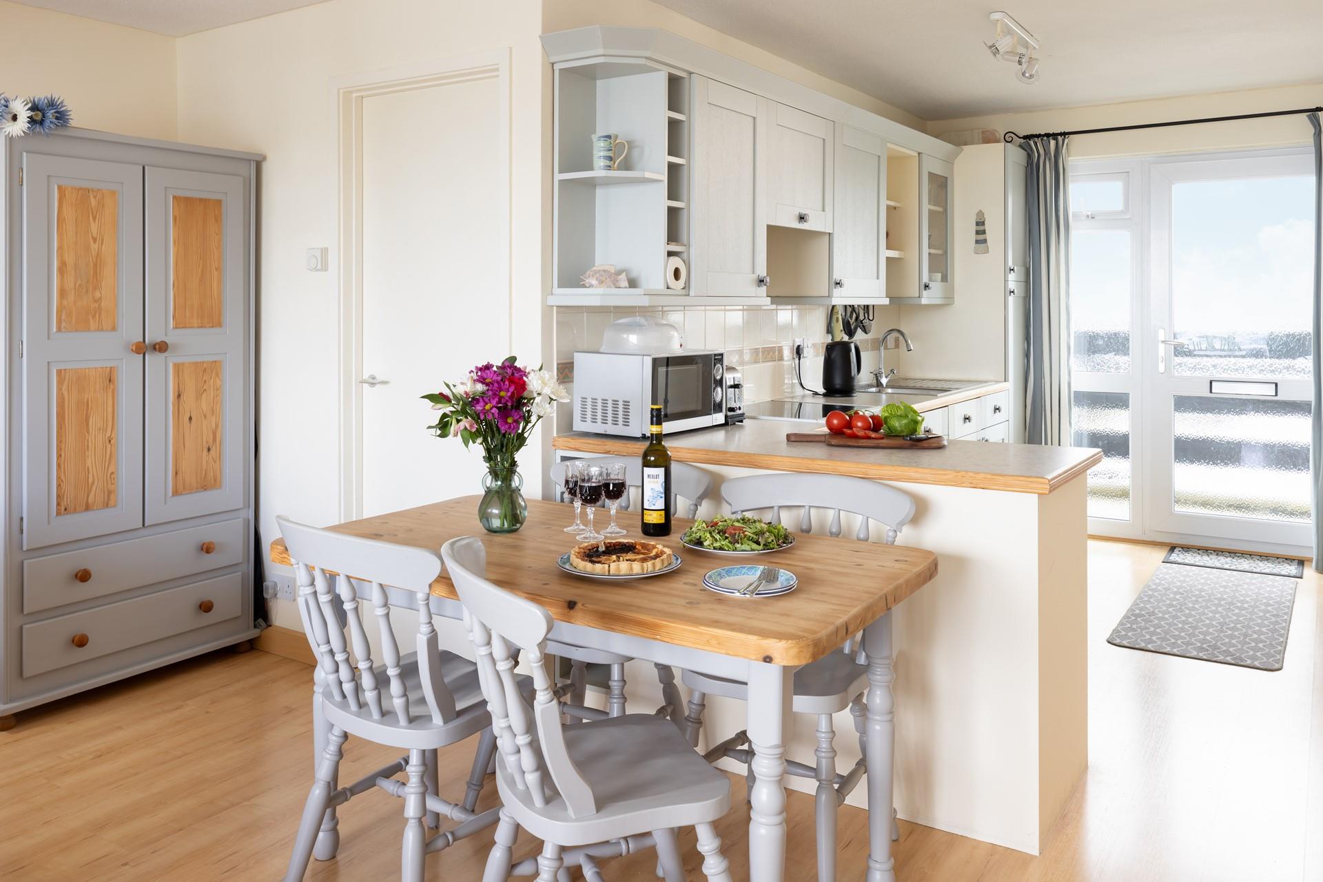 The kitchen and dining area has all you need.