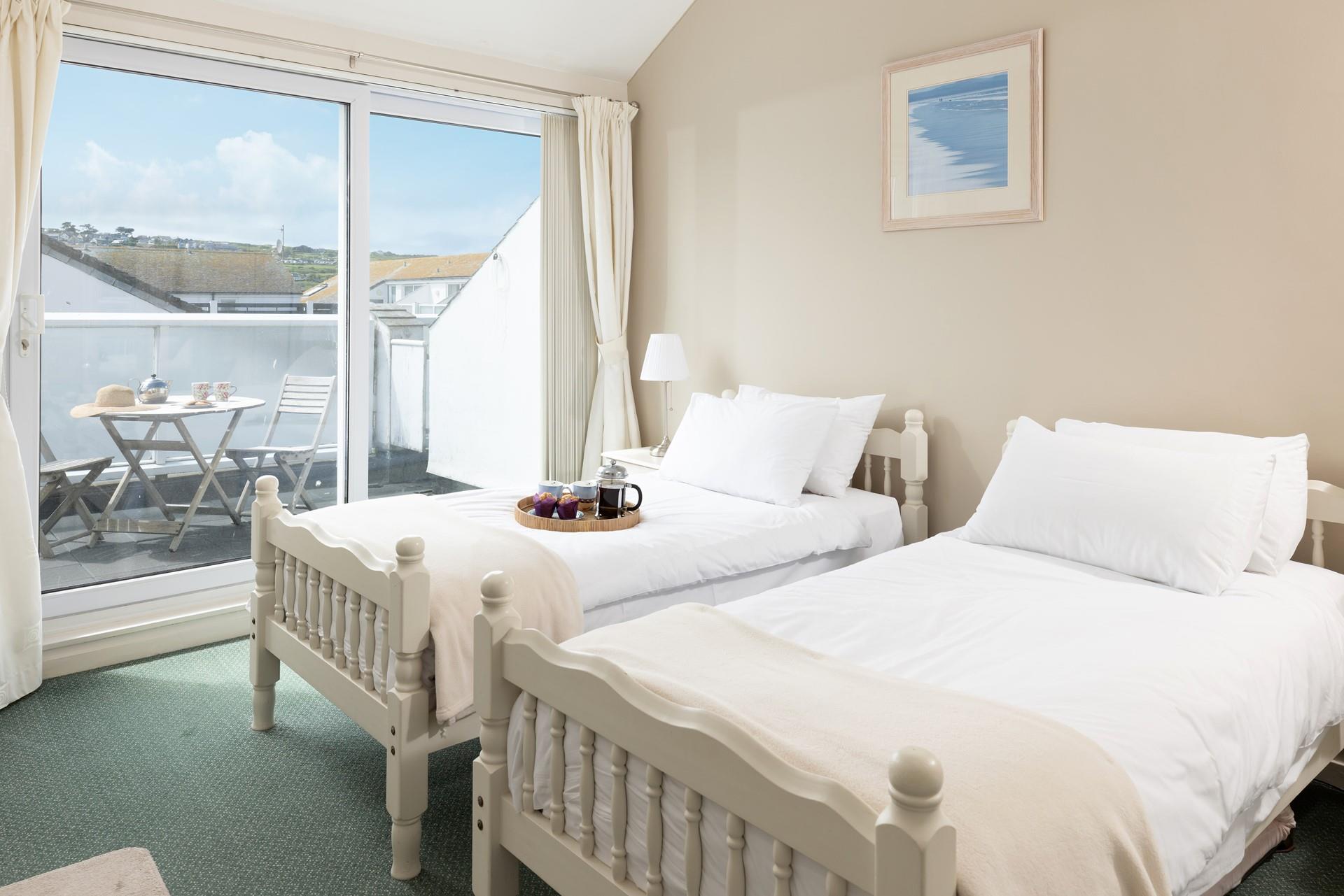 Step from the bedroom straight onto the patio in the mornings and let the sea air in.