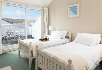 Step from the bedroom straight onto the patio in the mornings and let the sea air in.