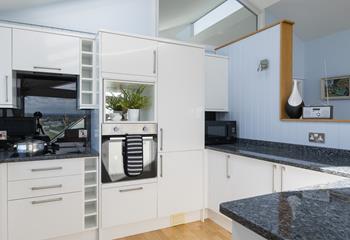 Whip up a delicious meal in the well-equipped kitchen.