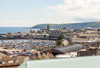 Enjoy watching the hustle and bustle of the town with views over Penzance. 