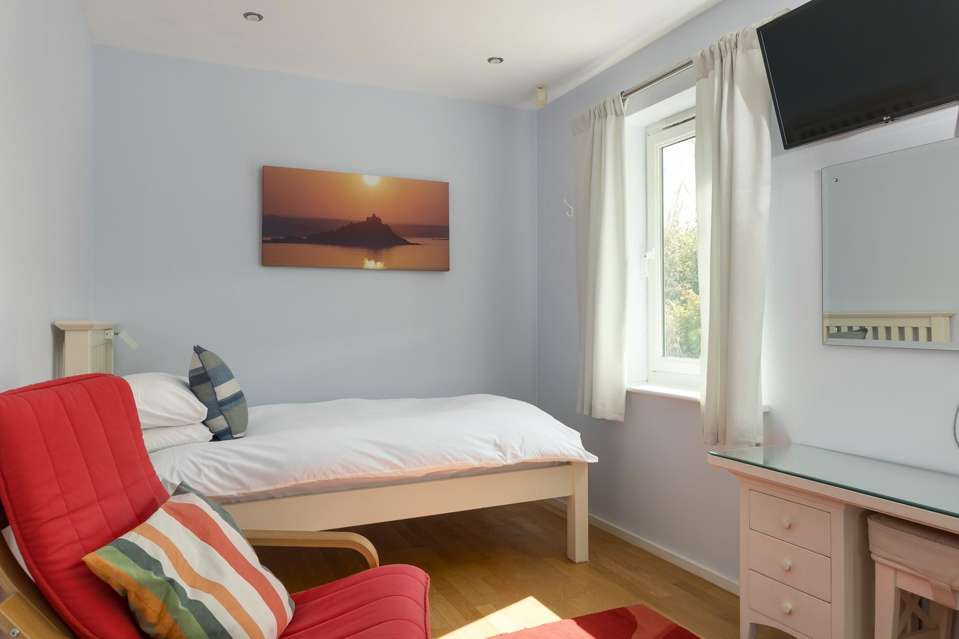 Bright pops of colour feature in bedroom 2. 