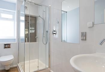 The downstairs bathroom is the ideal space to get ready for the day.
