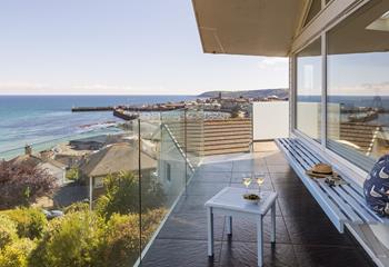 Watch the boats bob around in the harbour over a glass of wine. 