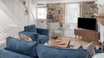 Beautiful stonework and a cosy fireplace create a truly unforgettable escape.