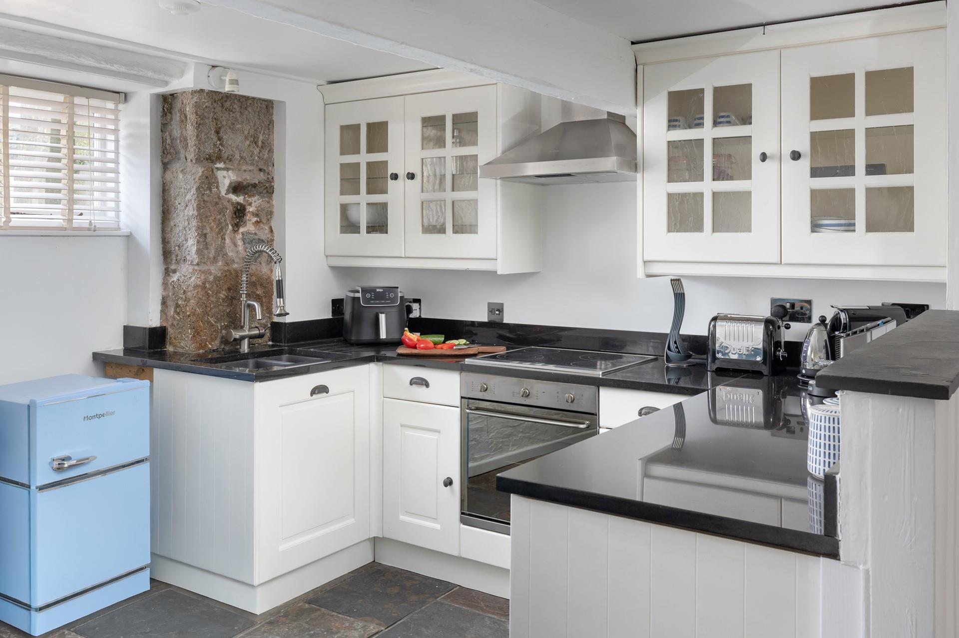 The kitchen is well-equipped with all you need.