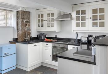 The kitchen is well-equipped with all you need.