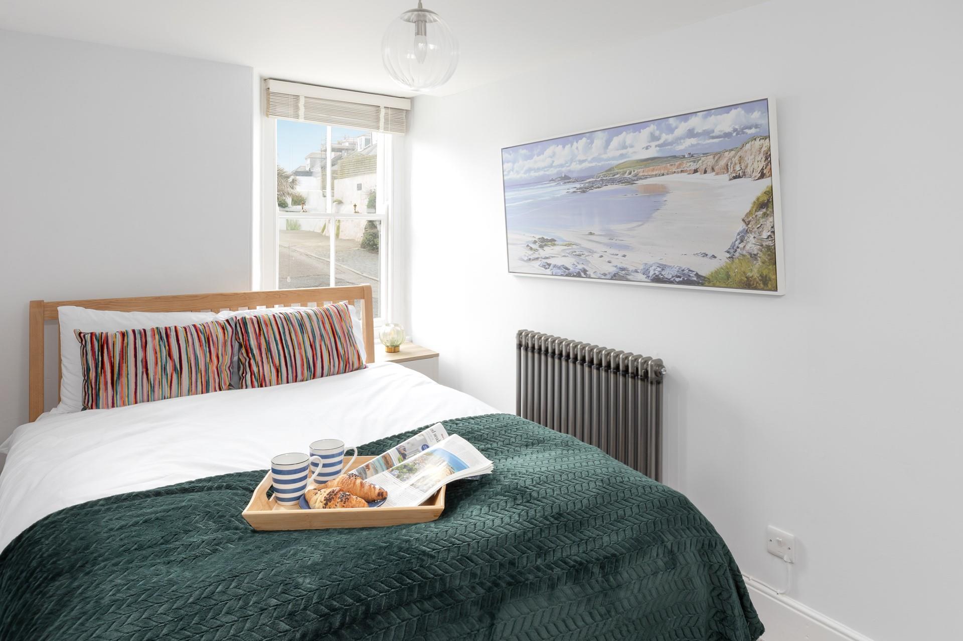 Bedroom 2 has a comfortable double bed.