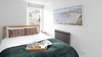 Bedroom 2 has a comfortable double bed.