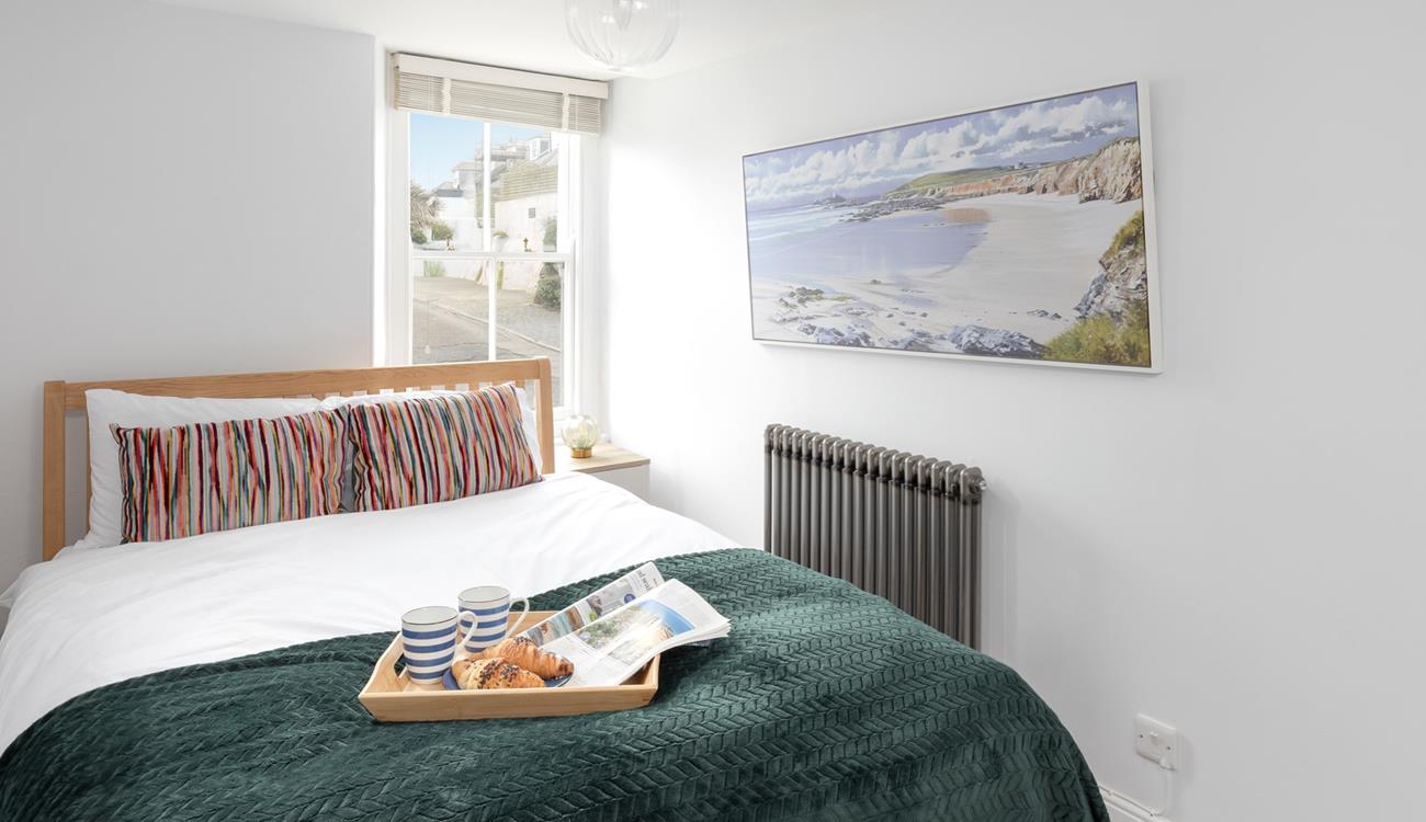 Bedroom 2 has a comfortable double bed.