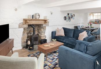 Spend days wandering the pretty harbourside or relaxing on the beaches before returning to this charming cottage.