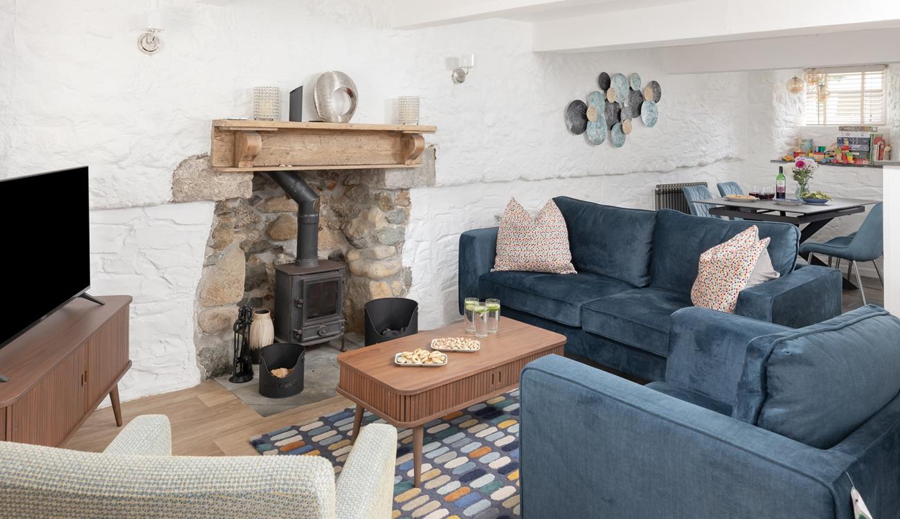 Spend days wandering the pretty harbourside or relaxing on the beaches before returning to this charming cottage.
