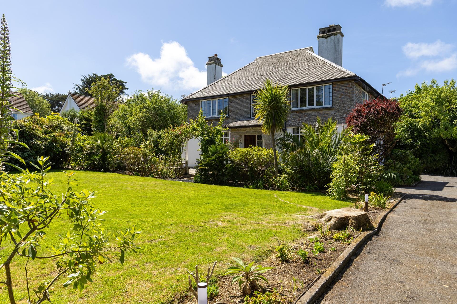 The ample garden offers plenty of space for little ones to play!