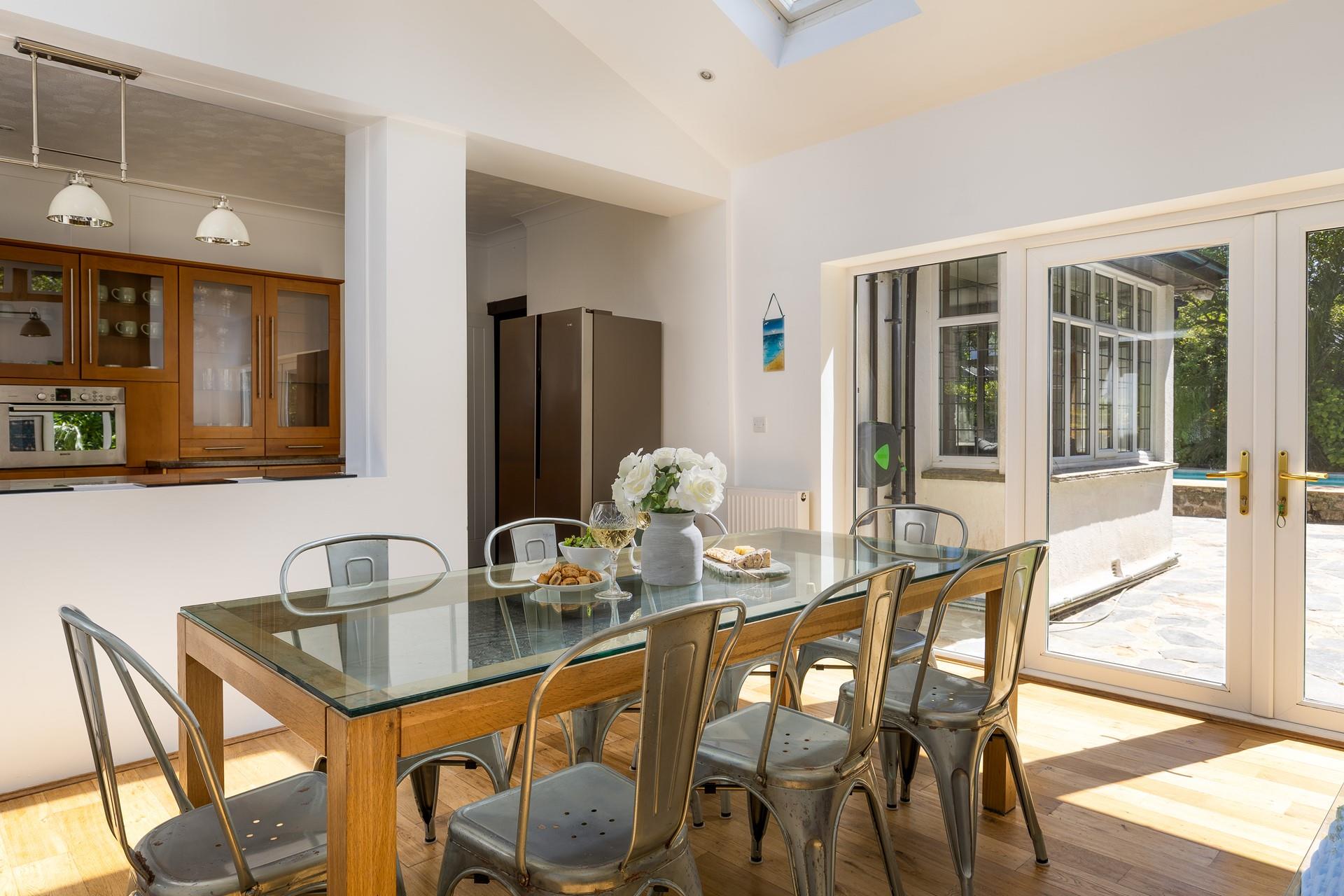 The open plan kitchen and dining area is a social space, perfect for holiday mealtimes.