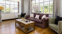 Soft, muted tones create a calming sanctuary, where everyone can unwind.