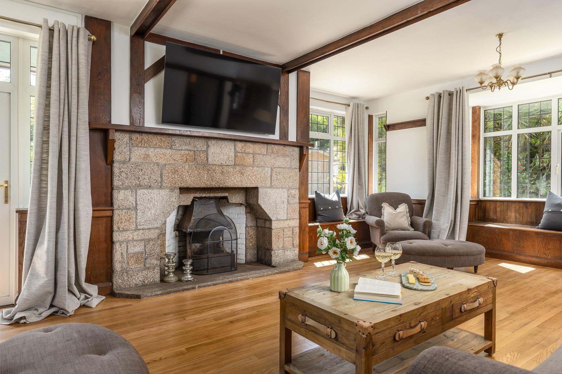 Traditional features meet modern styling in the spacious sitting room.