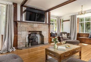 Traditional features meet modern styling in the spacious sitting room.