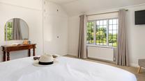 Bright and spacious, bedroom 2 has all you need to relax in comfort.