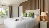 Bedroom 1 offers a peaceful night's sleep in the king bed.