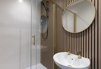 Start the day with a refreshing shower in the contemporary en suite.