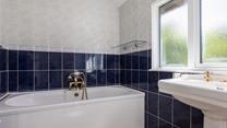 The family bathroom has a bath, perfect for soaking after a ramble along the coast path.