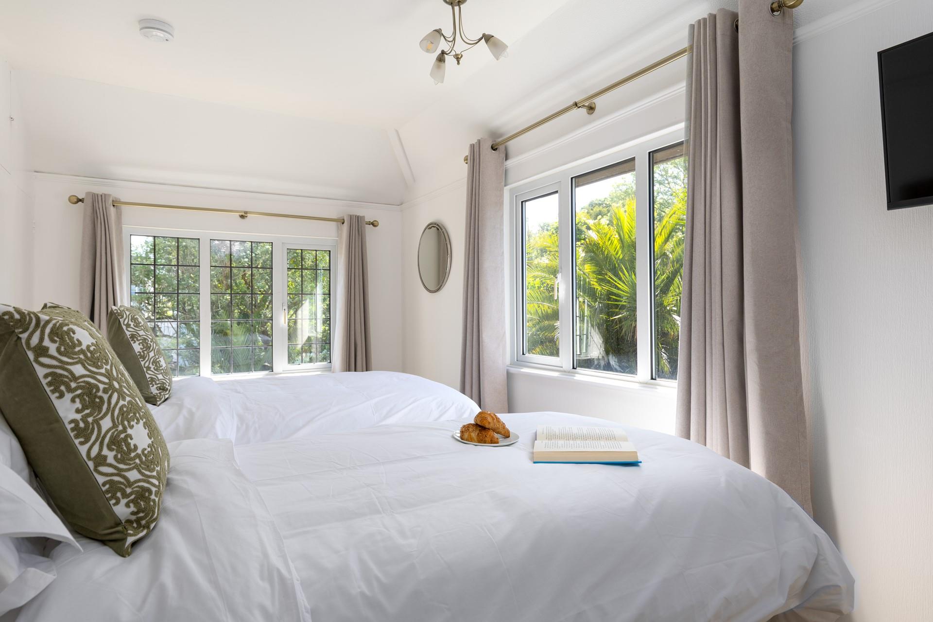 Feel like you're in paradise, waking up to views of sub-tropical flora.