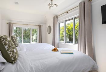 Feel like you're in paradise, waking up to views of sub-tropical flora.