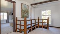 Beautiful wooden beams adorn the high ceilings. 