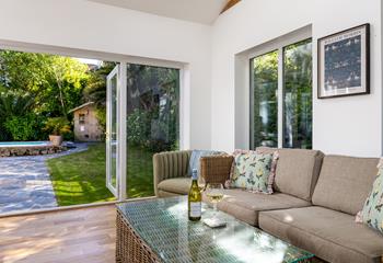 Step from the dining room into the garden, making the most of outdoor living!