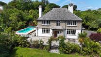 Set within private gardens, this charming retreat is perfect for a family getaway.