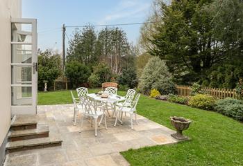 Beautifully manicured, the garden reflects the pretty village location.