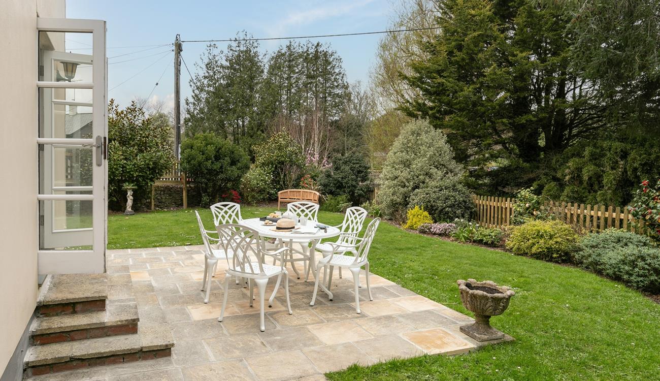 Beautifully manicured, the garden reflects the pretty village location.