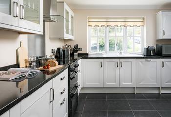 The kitchen has all the amenities you need, including a Nespresso machine, air fryer, and dishwasher!