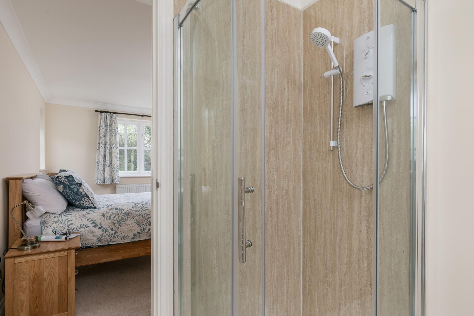 Bedroom 1 also boasts an en suite shower room.