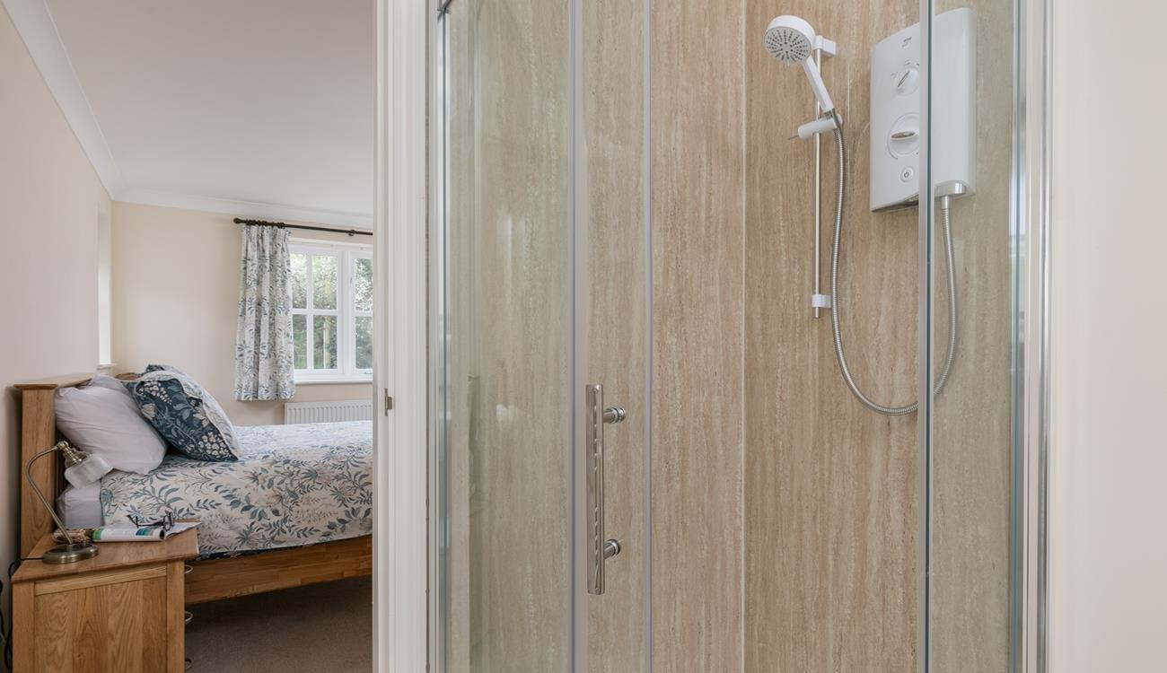 Bedroom 1 also boasts an en suite shower room.