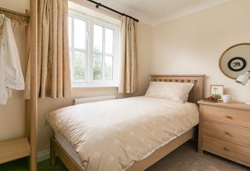 Bedroom 4 is another single, offering flexible sleeping arrangements.
