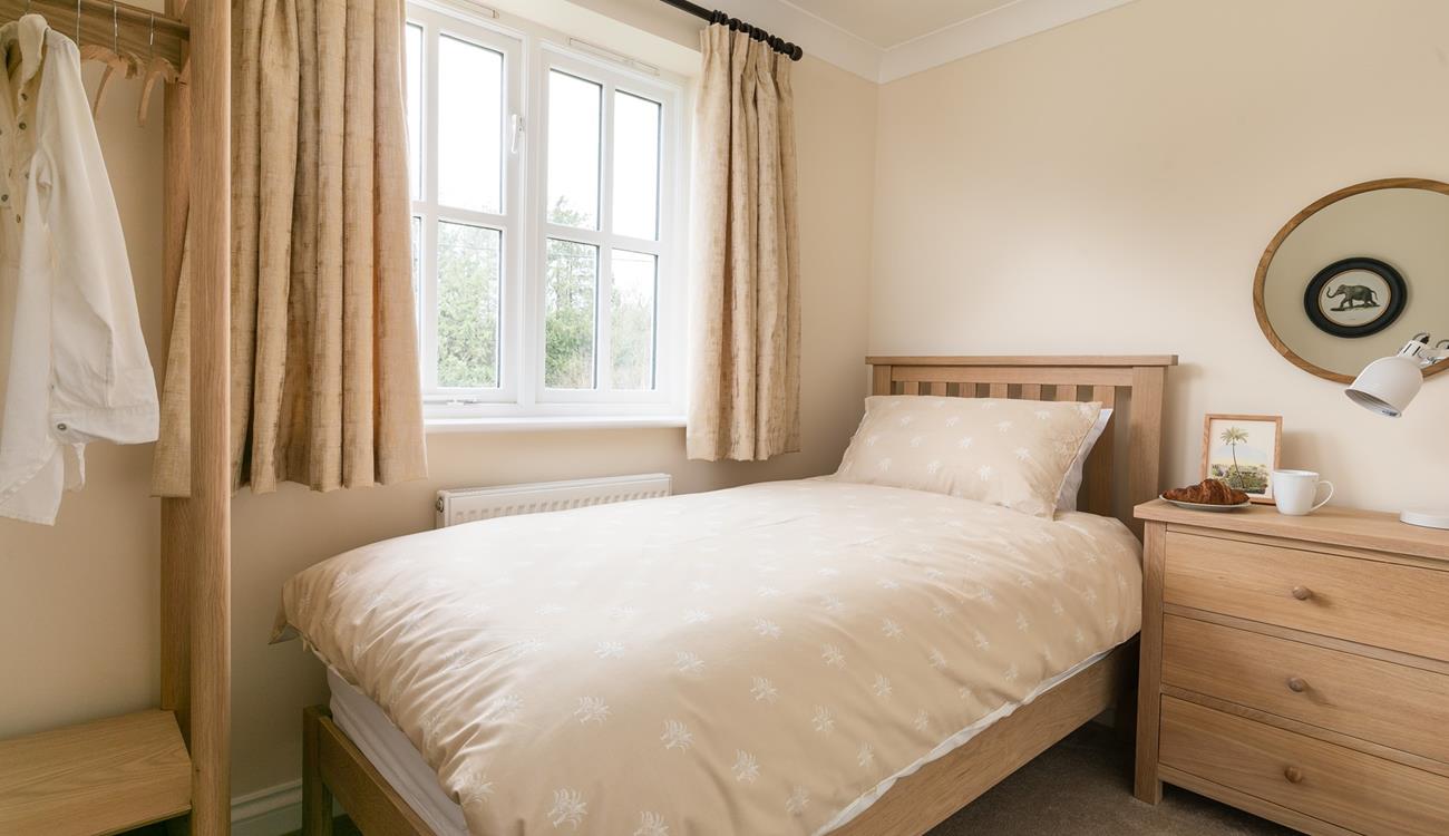Bedroom 4 is another single, offering flexible sleeping arrangements.