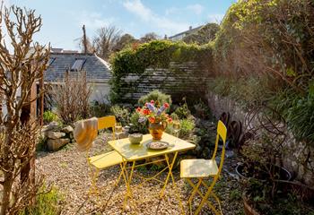 Enjoy sunny mornings and balmy evenings in the quaint garden.