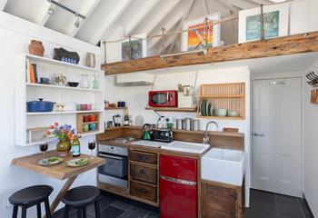 The kitchen area is well-equipped with all the mod cons you need.