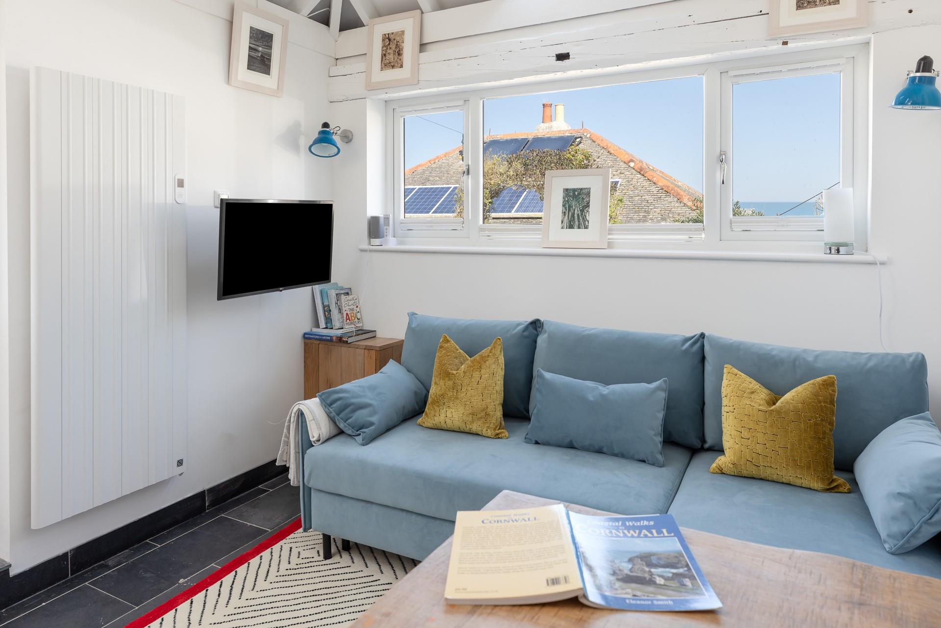 With views across the rooftops and out to sea, The Art House is a quaint coastal studio.