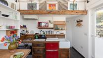 Beautiful artwork adorns the stylish studio.