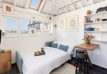 The sofa bed creates a comfortable corner for peaceful nights' sleep.