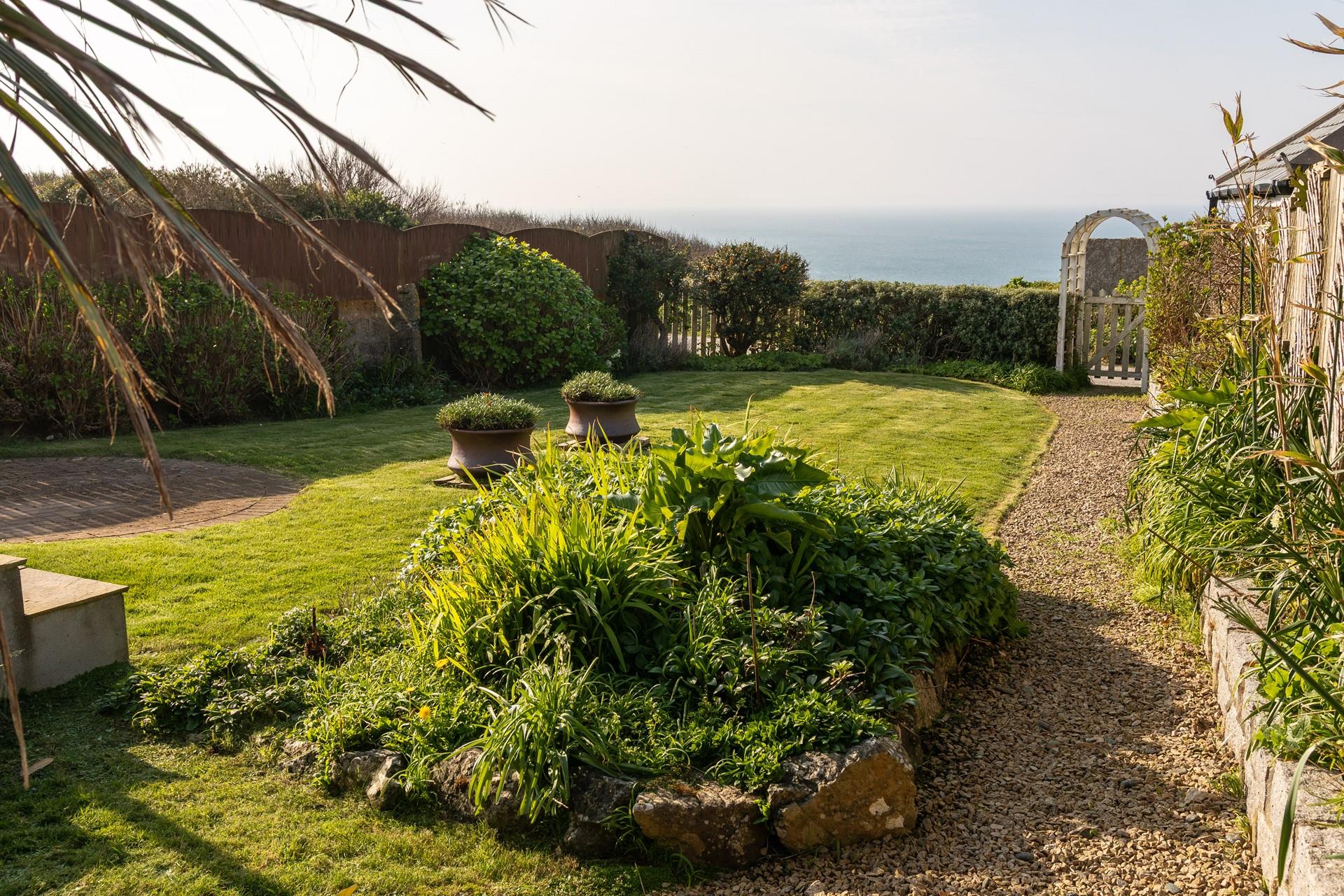 The large garden is ideal for the kids to let off some steam!