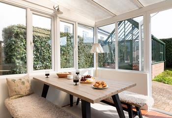 Tuck into a feast in the light and sunny dining area.