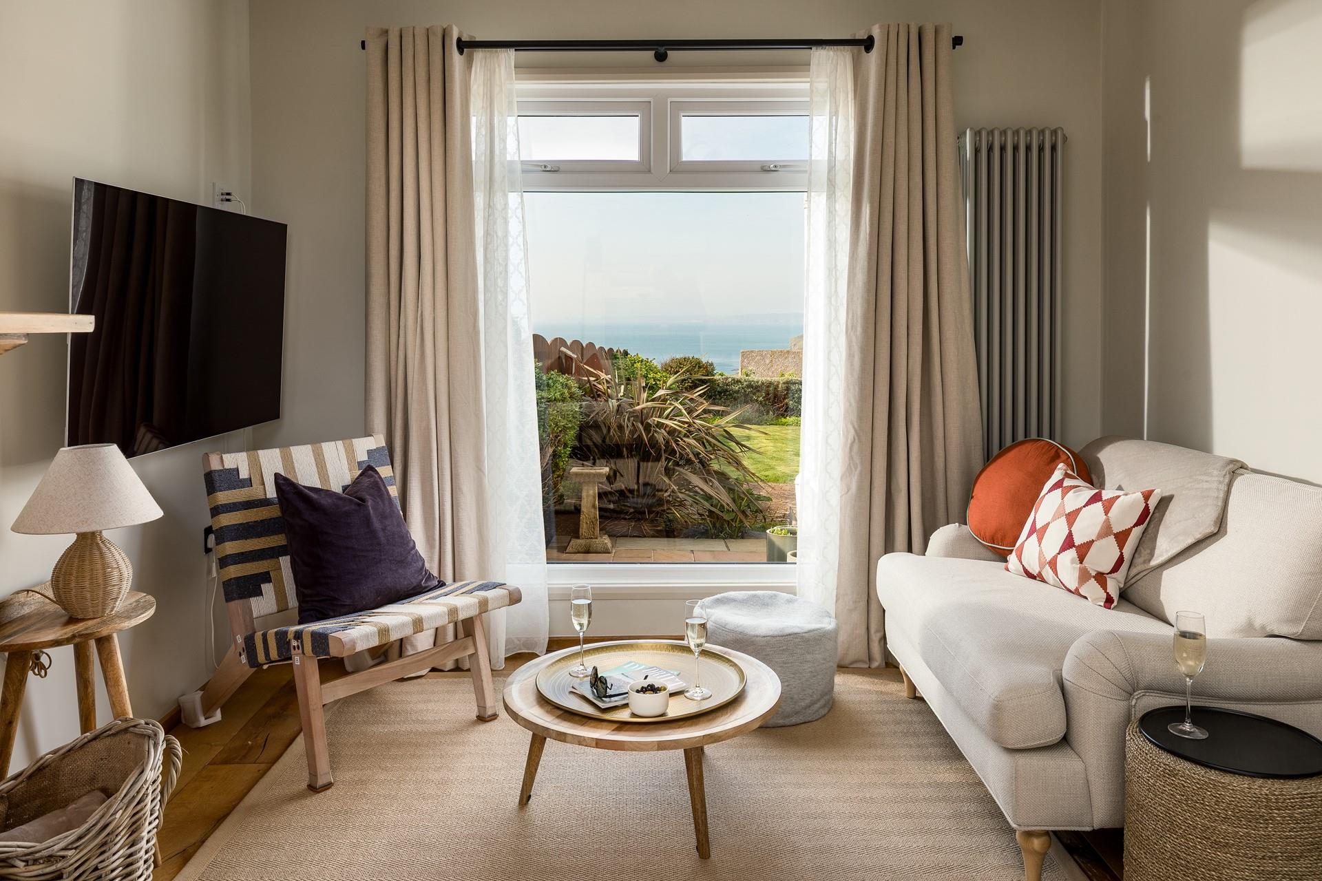 Sea views also feature in the modern sitting room.