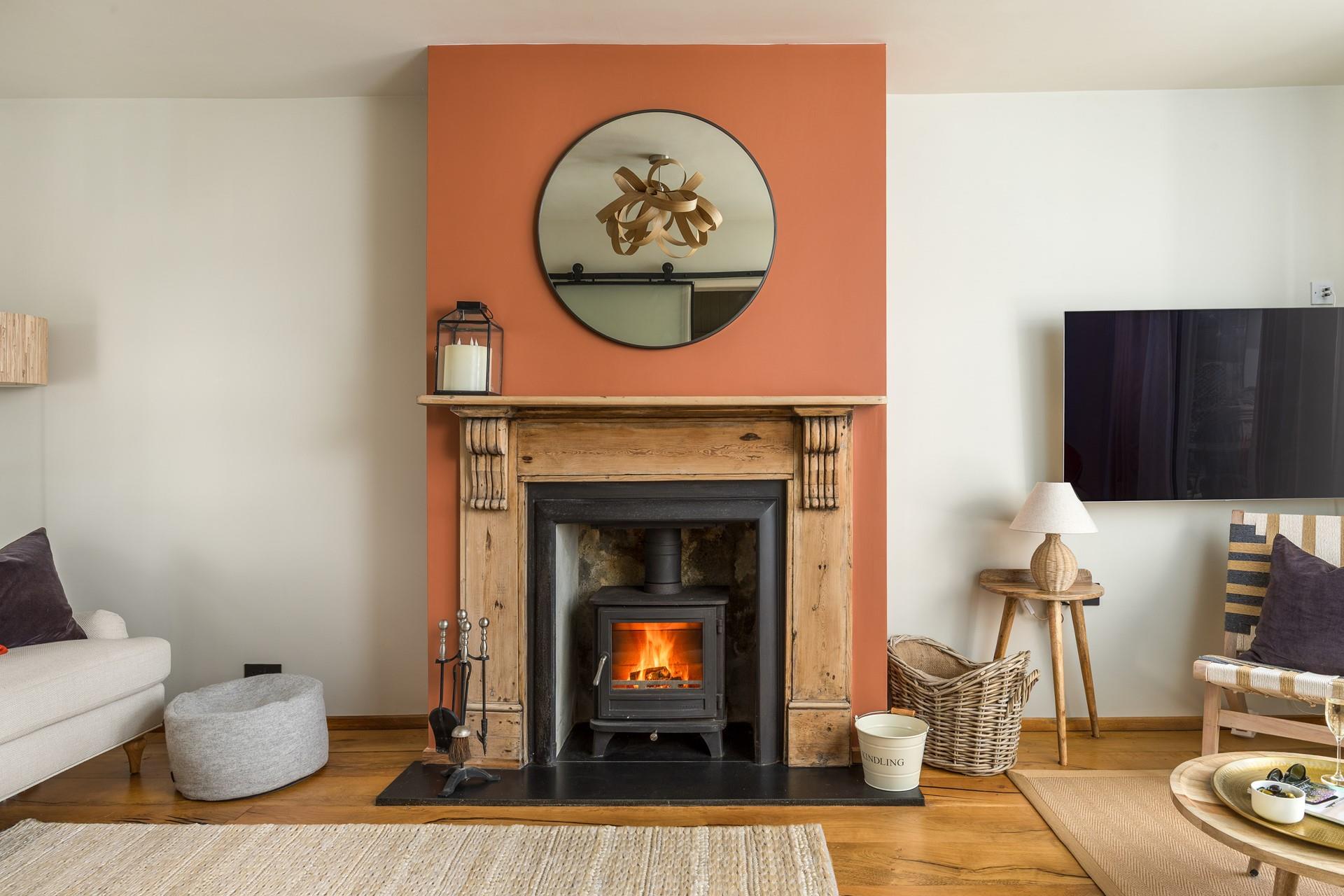 The woodburner is a delight to return to after a coastal walk.