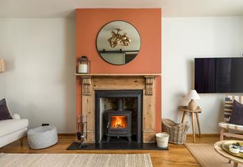 The woodburner is a delight to return to after a coastal walk.